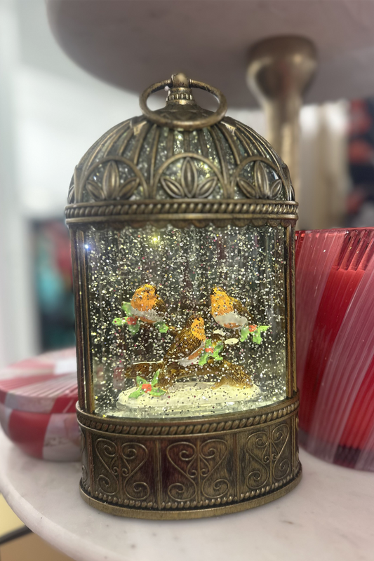 Red Robins In Their Aviary